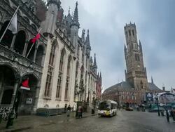 HD time-lapse: Bell Tower Belfort at Market square Bruges Belgium Stock Footage