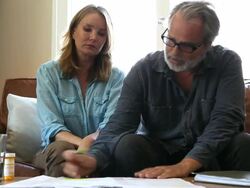 Couple adding up medical bills Stock Footage