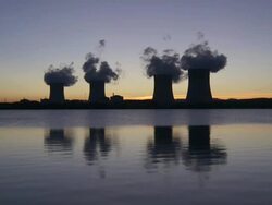 WS Cooling towers of power station against pink and purple sky / Cattenom, Lorraine Mosel, FRANCE Stock Footage