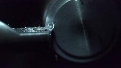 Slow motion of metal lathe carving metal Stock Footage