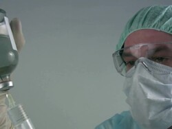Medical scientist \preparing syringe\ Stock Footage