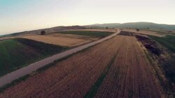 Aerial panorama over green fields farms summer Stock Footage