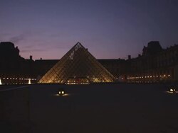 WS View of louvre pyramid at night with fountains / Paris, France Stock Footage