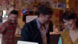 Young couples look for albums together in vintage record store Stock Footage