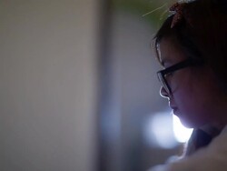 Woman using laptop computer Stock Footage