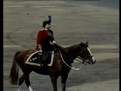 Eventful Britain Archive: Queen Elizabeth II riding side-saddle at Trooping of the Colour, Horse Guards Parade, London, United Kingdom. 1958. Stock Footage
