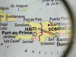 Magnifying glass over Haiti map Stock Footage