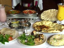 Indian Meal For Two In Restaurant News Clip