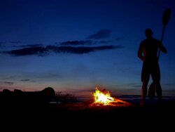 WS Kayaker Rejoicing By The Campfire Stock Footage