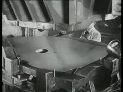 Car manufacture; body work of the automobile is pressed from sheet steel, UK 1939 Stock Footage