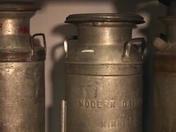 An old rusty and dented milk churn  Stock Footage