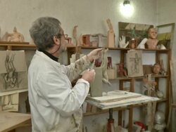 HD DOLLY: Sculptor Artist Modeling Clay Stock Footage