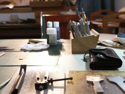 leatherworker paint  fish pattern on leather Stock Footage