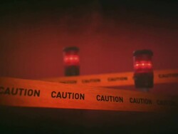 Warning sign with flashing light reflection Stock Footage