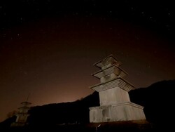WS T/L View of Stone pagoda in Gameunsa Temple site (Korea National Treasure 112) and stars in the night sky / Gyeongju, Gyeongsangbuk do, South Korea  Stock Footage