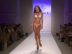 Models walk the runway during the Vitamin A by Amahlia Stevens swimwear 2013 show at the Vitamin A by Amahlia Stevens - Runway - MBFW Miami Swim 2013 Stock Footage