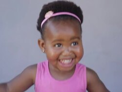 Excited african baby girl dancing with joy Stock Footage