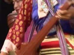 MS TU Musicians dancing and playing at same time in traditional costumes AUDIO / Dharamsala, Himachal Pradesh, India Stock Footage