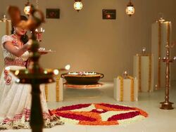 Young woman burning oil lamp in diwali festival  Stock Footage