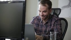 Happy Designer Using Computer Stock Footage