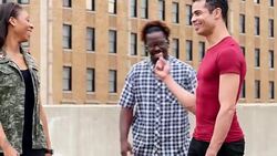 MS Laughing group of friends hanging out on rooftop Stock Footage