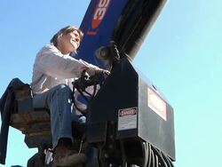 MS ZI Crane operator at working during framing of an energy efficient post / Grass Lake, Michigan, USA  Stock Footage