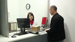 Post Office - Mailing a Parcel Stock Footage