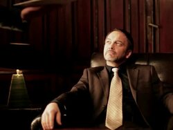 Butler serves drink and cigar to the hero Stock Footage