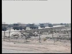 Supply convoy for new US troops crosses from Kuwait into Iraq News Clip