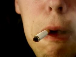 LIGHTING A SMOKE (HD/DV) Stock Footage