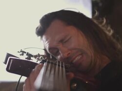 Handheld A guitarist looks down his fretboard. Stock Footage