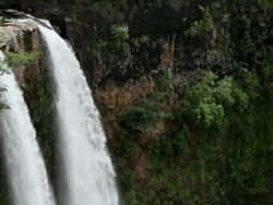 MS PAN Wailua falls in Hawaii / Kauai, Hawaii, United States Stock Footage