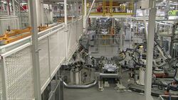 Robots operate on an automotive assembly line. Stock Footage