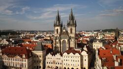 Red-roofed buildings surround Tyn Church. Stock Footage