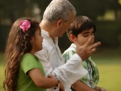 Senior man telling story to his grandchildren  Stock Footage