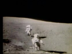 2 astronauts running toward camera on Moon / Apollo 16 Stock Footage