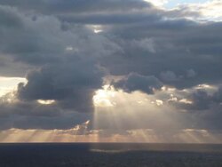 sunrays through the clouds (timelapse) Stock Footage