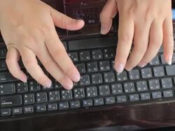View from the top of businesswoman Typing at Keyboard Stock Footage