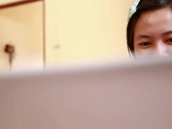 Woman using laptop Stock Footage