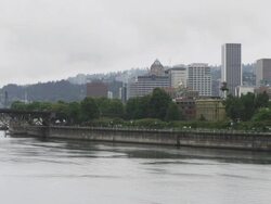WS View of Rainy Portland sits on edges of Willamette River / Portland, Oregon, United States  Stock Footage