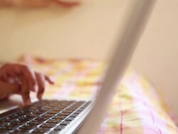 Woman using laptop Stock Footage