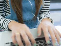 Woman using laptop computer Stock Footage