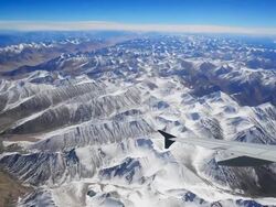 aerial view of mountains and clouds on top of Asia Stock Footage