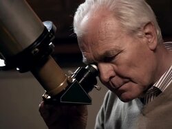 Old man with telescope Stock Footage