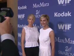 Jenna Elfman and Nicola Maramotti at 2013 Women In Film Crystal + Lucy Awards Sponsored By Max Mara, Swarovski And Kodak Stock Footage