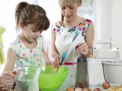 HD: Mother and daughter making cookies. Stock Footage