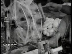Women spinning girls knotting rug Instructional Video