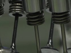 CU TD Engine valves in Ford Motor Company internal combustion engine at the Detroit Auto Show / Detroit, Michigan, USA Stock Footage