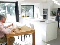 HD TIME LAPSE: Couple Having Breakfast Stock Footage