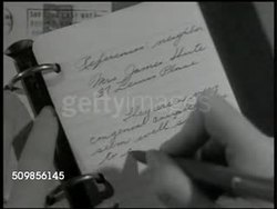 1946: CHECKING REFERENCES: Social Worker talking to neighbors of childless couple (30s), talking w/ employer in office (no SOT) Female hand making notes under employment portion of application. (Accountant making $5,200 a year) Instructional Video